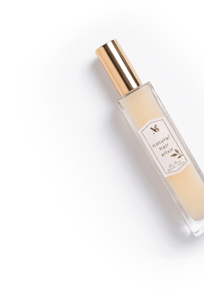 Prirodni losion za kosu sa elegantnim dizajnom bočice.